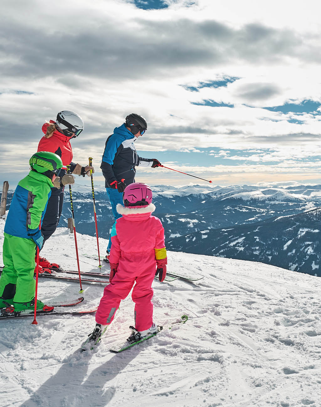 Winter holidays, Skiing vacation. Family skiing at Großeck Speiereck, Obertauern, Katschberg. Ski region Salzburg Lungau.